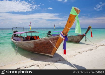 boats and the clear sea Phi Phi Leh south of Thailand