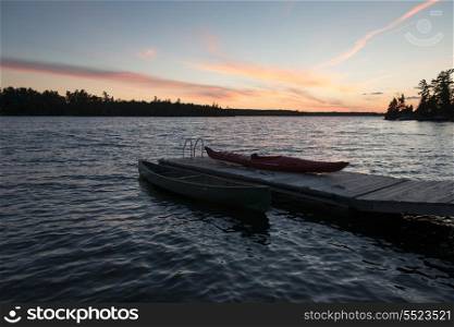 Boats at a dock, Kenora, Lake of The Woods, Ontario, Canada
