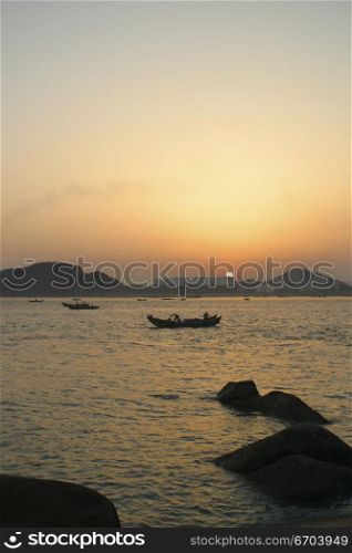 Boats by the shore in Xiamen China.