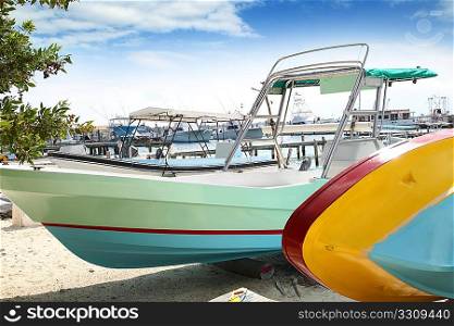 boats colorful in Isla Mujeres beach Mexico Mayan Riviera Cancun