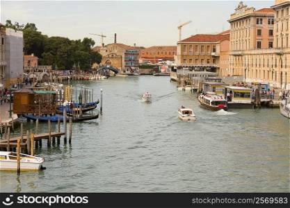 Boats docked in a canal, Grand Canal, Venice, Italy