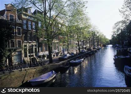 Boats in a canal, Amsterdam, Netherlands