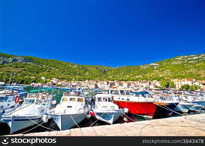 Boats in Komiza harbor summer view, Island of Vis, Croatia