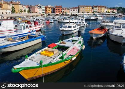 Boats in marina of Rovinj, Istria, Croatia. Typical mediterranean seaside town.