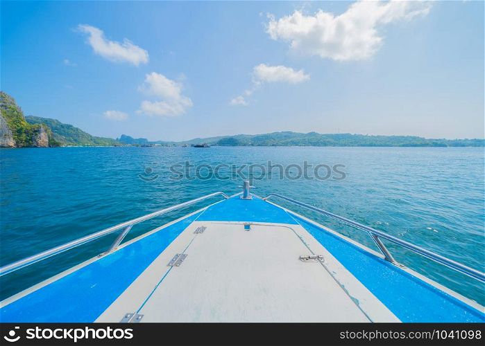 Boats in Phi Phi, Maya beach with blue turquoise seawater, Phuket island in summer season in travel holiday vacation trip. Andaman ocean, Thailand. Tourist attraction with blue sky. Nature landscape.