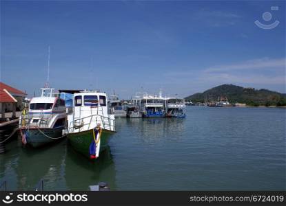Boats in port, Phuket island, Thailand