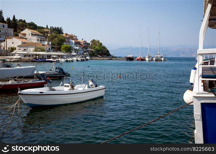 boats in the bay of a small Greek town on the island of Corfu

