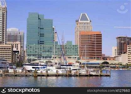 Boats moored at a harbor, Inner Harbor, Baltimore, Maryland, USA