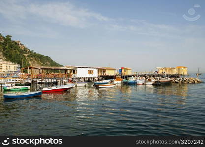 Boats moored at a harbor, Marina Grande, Capri, Sorrento, Sorrentine Peninsula, Naples Province, Campania, Italy