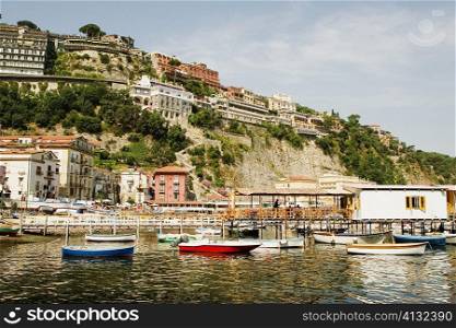 Boats moored near a pier, Marina Grande, Capri, Sorrento, Sorrentine Peninsula, Naples Province, Campania, Italy