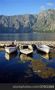 Boats near pier in Boka Kotoska, Montenegro
