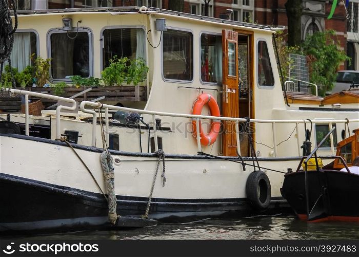 Boats on a canal in Amsterdam. Netherlands