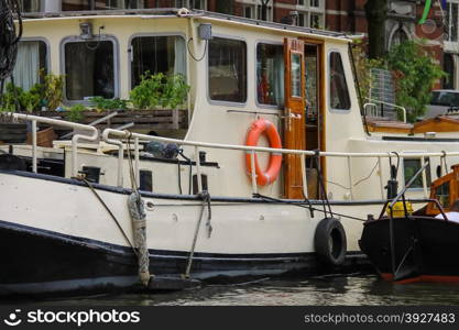 Boats on a canal in Amsterdam. Netherlands