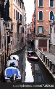 Boats on a canal, Venice, Italy