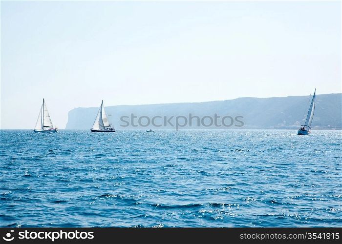 boats sail regatta with sailboats in mediterranean sea on Denia alicante