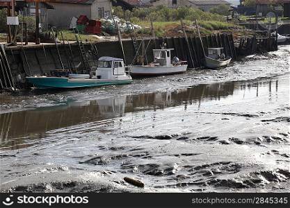 Boats stranded on mudflats