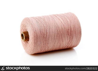 bobbin with pink thread isolated on a white background