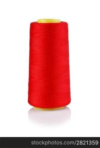 bobbin with red thread isolated on a white background