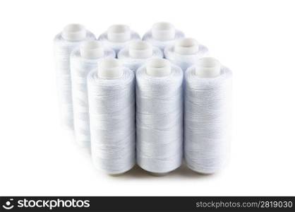 bobbin with white thread isolated on a white background