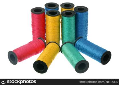 Bobbins of thread isolated on white background