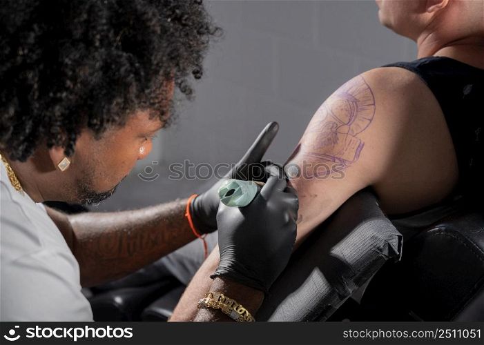 Body art at the tattoo studio. High quality photography. Body art at the tattoo studio