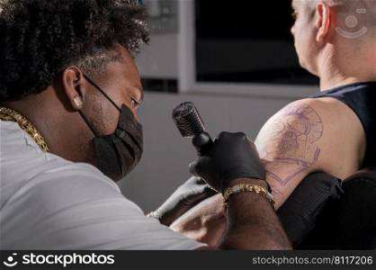 Body art at the tattoo studio. High quality photography. Body art at the tattoo studio