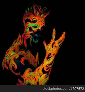 Body art glowing in ultraviolet light