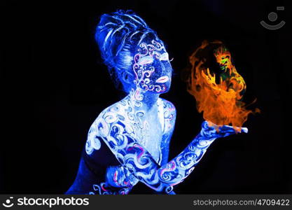 Body art glowing in ultraviolet light, four elements, Air against Fire