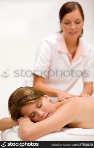 Body care - woman back massage at day spa