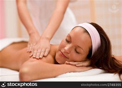 Body care - woman back massage at day spa massage