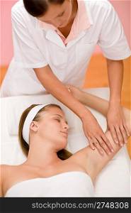 Body care - woman hand massage in day spa