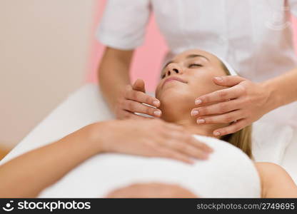 Body care - Woman receive luxury facial massage at day spa