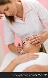 Body care - Woman receive luxury facial massage at day spa