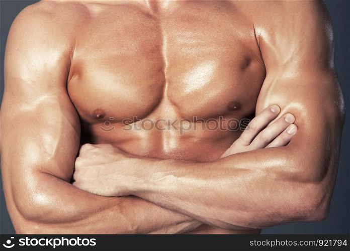 Body of muscular man. Horizontal studio shot