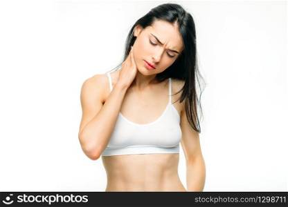Body pain, woman have problem with neck, pinched nerve, white background. Female person in white lingerie, medical advertising or concept