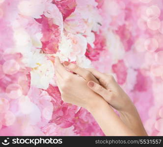 body parts, cosmetics and spa concept - close up of female soft skin hands