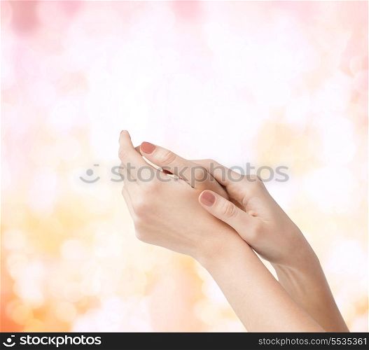 body parts, cosmetics and spa concept - close up of female soft skin hands