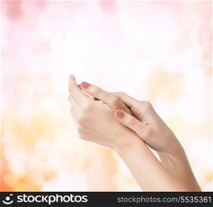 body parts, cosmetics and spa concept - close up of female soft skin hands