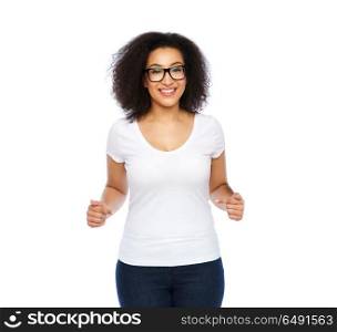 body positive and people concept - happy african american woman in white t-shirt and glasses pointing fingers to herself. african american woman in white t-shirt. african american woman in white t-shirt