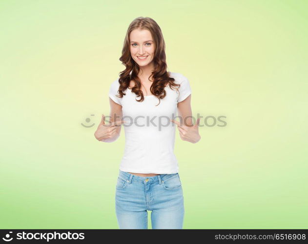 body positive and people concept - happy slim woman in white t-shirt pointing fingers to herself over lime green background. woman in white t-shirt pointing fingers to herself. woman in white t-shirt pointing fingers to herself