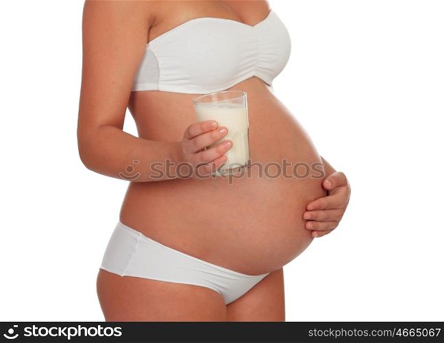 Body pregnant in underwear with milk glass isolated on a white background