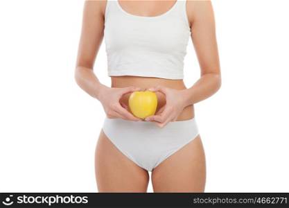 Body woman in underwear with a apple isolated on a white background