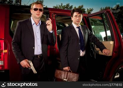 bodyguard and its boss leave the car