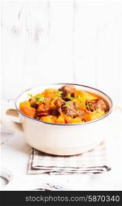 Boeuf Bourguignon - stewed meat with vegetables in casserole