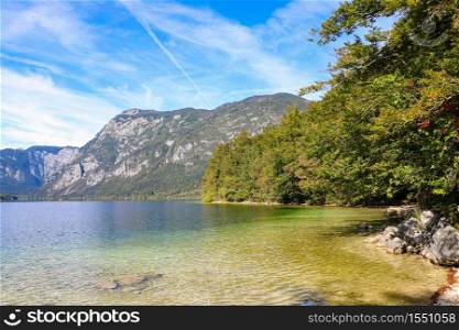 Bohinj lake shore with mountain views in Slovenia. Bohinj lake shore with mountain views in Slovenia.