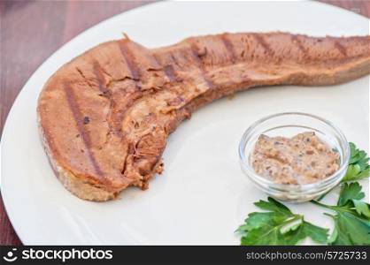 Boiled beef tongue with sauce
