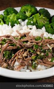 boiled beef with pungent spokes sauce garnish rice with broccoli