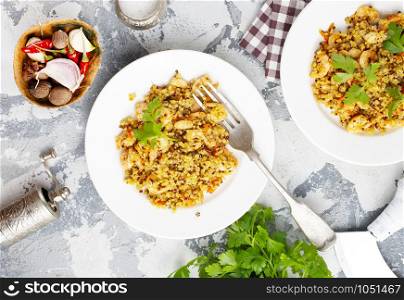 boiled bulgur with sauce and fried shrimps