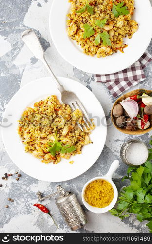 boiled bulgur with sauce and fried shrimps