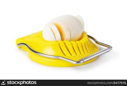 Boiled egg in the egg slicer isolated on a white background. Boiled egg in the egg slicer.